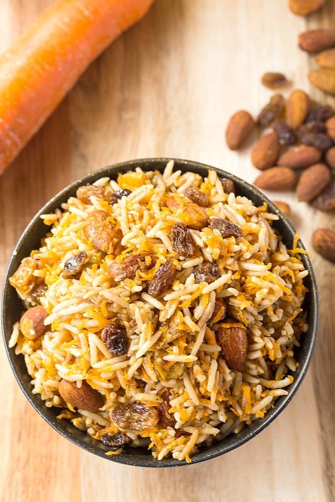 Vegan Persian Rice Salad- A delicious, Persian style sweet and savoury salad based off almonds, raisins and fragrant basmati rice. Perfect eaten hot or cold, this salad is vegan, gluten free, dairy free, light and fresh- Perfect for any meal, especially a mother's day brunch! @thebigmansworld - thebigmansworld.com
