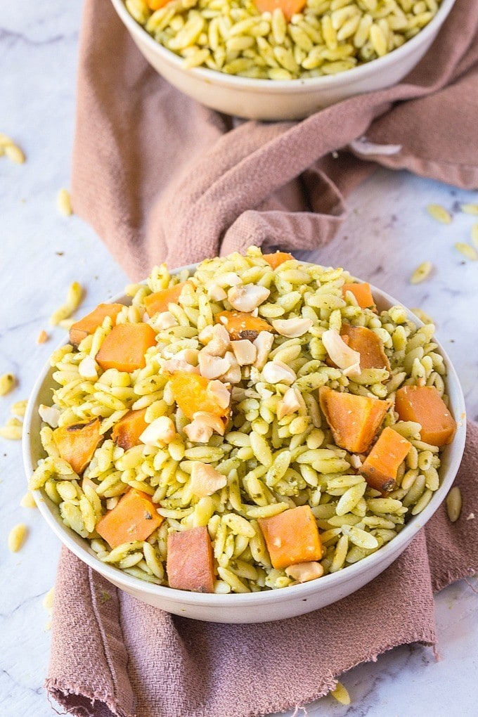 Pesto + Marinated Sweet Potato Orzo Salad- Take your picnics, barbecues and grilling sessions up a notch with this fancy yet super simple side dish- Pesto orzo salad! Filled with marinated slow roasted sweet potato chunks, it's tossed through a vegan pesto making it dairy free, vegan and with a gluten free option! @thebigmansworld - thebigmansworld.com