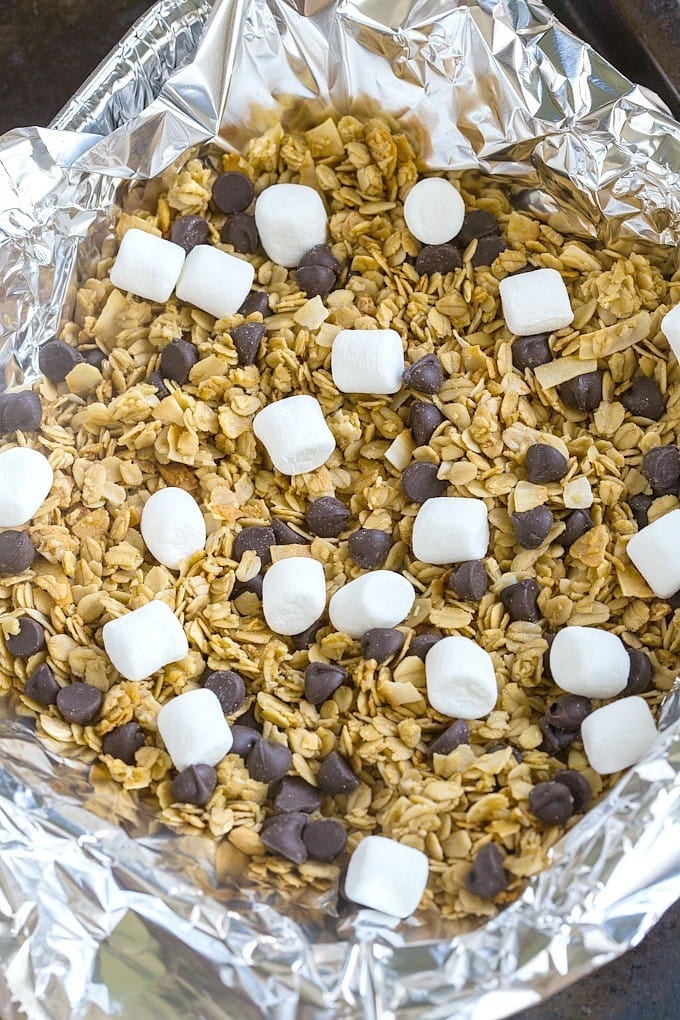Easy Campfire S'Mores Granola- Can be made over the campfire or on a grill- Vegan, gluten free and allergy friendly- A delicious snack or dessert! -thebigmansworld.com
