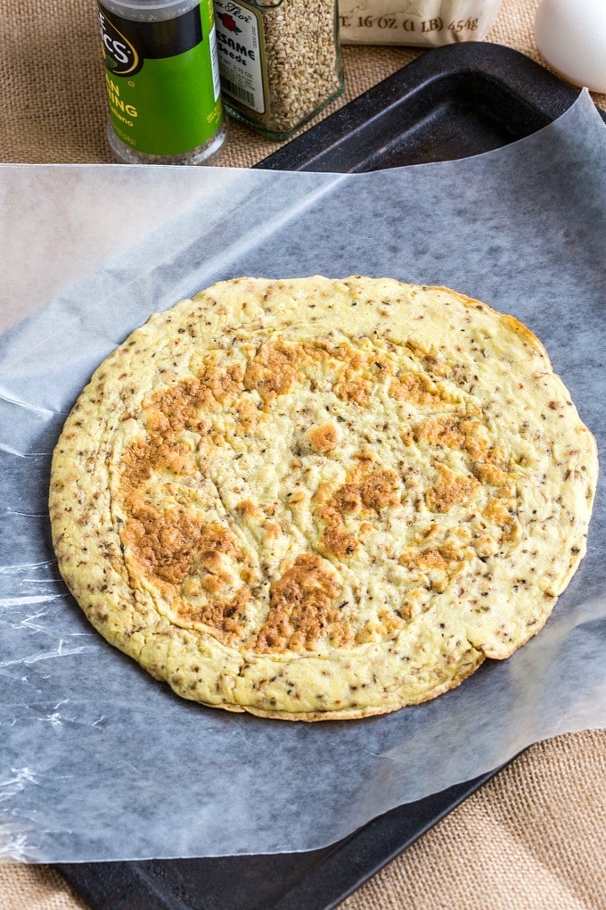 3 Ingredient Paleo Pizza Bases which have NO cauliflower and are made stovetop- They are ready in no time and chock full of protein! Gluten free and Whole30 friendly! 