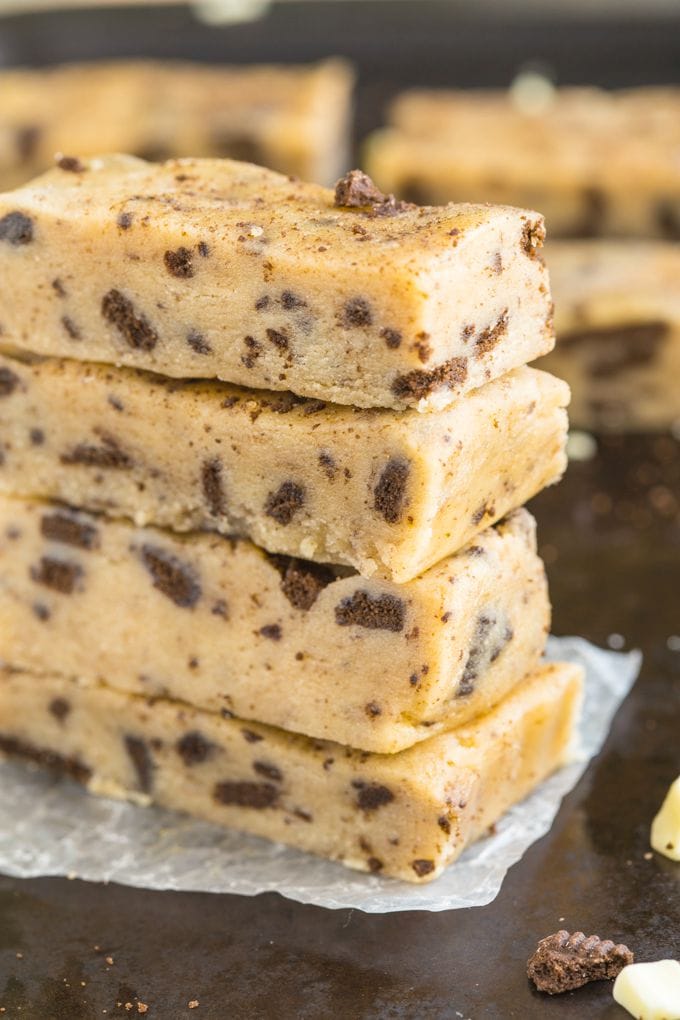Healthy No Bake Cookies and Cream Protein Snack Bars- Just 10 minutes and 1 bowl to whip these up- Soft, chewy and no refrigeration needed- They taste like candy! {vegan, gluten free, refined sugar free + paleo option!}
