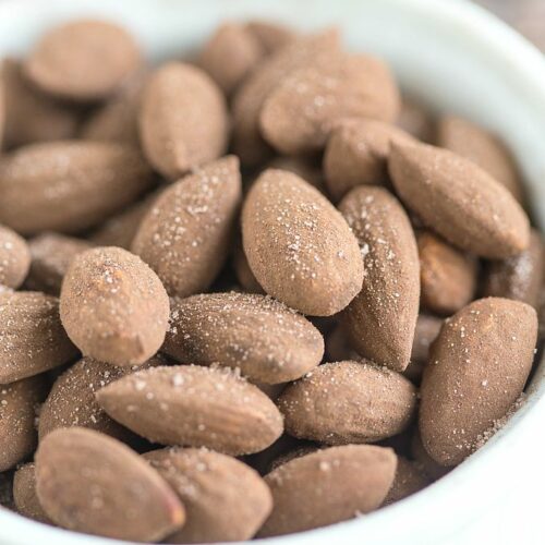 Tiramisu Roasted Almonds- Quick, easy and so darn delicious, you'd never guess these tiramisu roasted almonds were healthy too! {gluten free, vegan, paleo + sugar free option!} #coffee #tiramisu #almonds