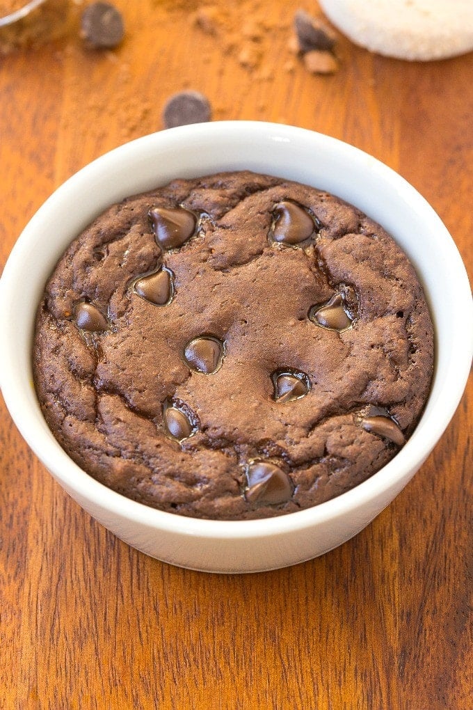 Healthy 1 Minute High Protein Brownie- SO fluffy, light and a little bit gooey, this high protein brownie tastes like dessert- NO butter, oil, white flour or sugar- Oven option too! {vegan, gluten free, paleo recipe}- thebigmansworld.com