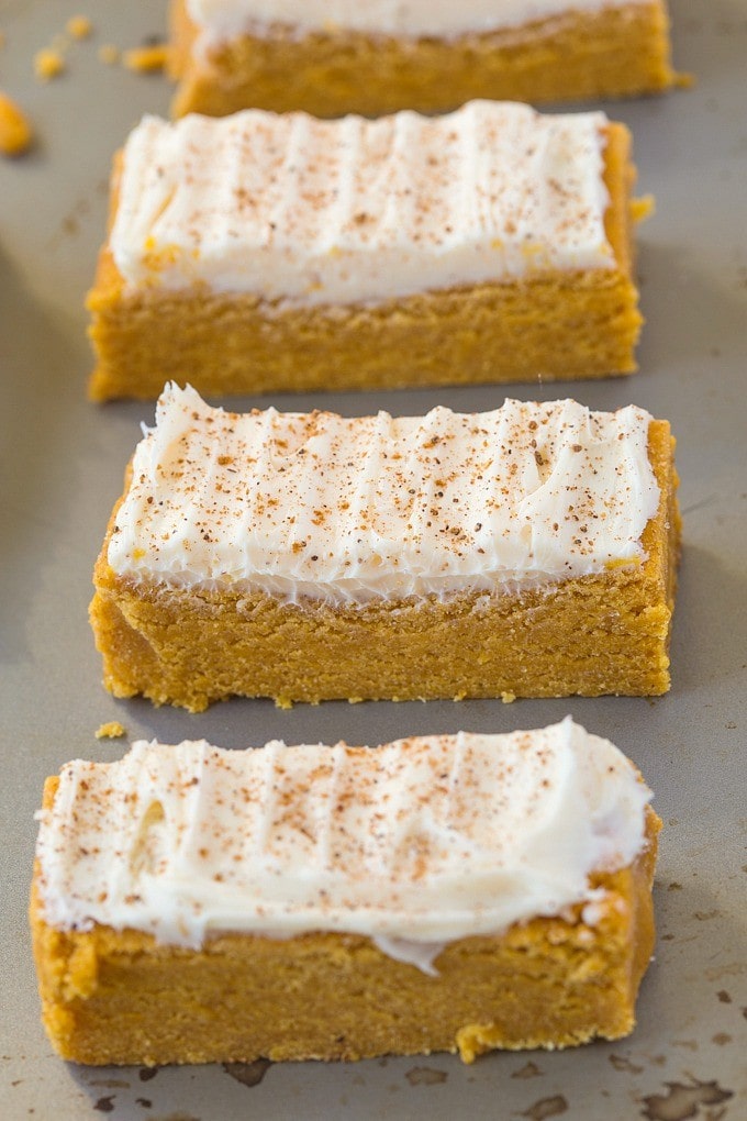 Healthy No Bake Carrot Cake Protein Bars- A delicious recipe which tastes like dessert but is so healthy, including the healthy frosting- Ready in 5 minutes! {vegan, gluten-free, paleo option}- thebigmansworld.com