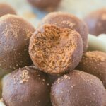 No Bake Peppermint Chocolate Bites are an easy 5-minute christmas or holiday paleo, vegan, keto and sugar-free recipe! Soft, chewy, protein-packed and delicious energy bites loaded with peppermint! #ketodessert #ketorecipe #vegandessert #christmasrecipe #energybites #proteinbites