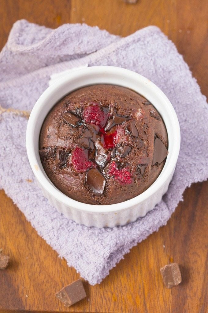Healthy 4 Ingredient Chocolate and Raspberry Mug Cake ready in just ONE minute- NO flour, NO grains, NO refined sugar and NO oil/butter but amazing- Oven option too! {vegan, gluten free, paleo recipe}- thebigmansworld.com