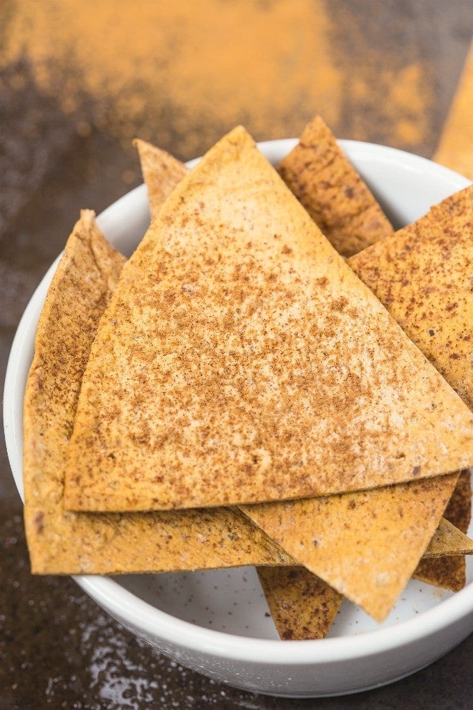 Healthy and Easy Baked Cinnamon Pita Chips which are sweet, salty, crunchy ,crispy and LOADED with flavor without the fat and NO sugar- It's protein packed too! {gluten free, vegan, sugar free recipe