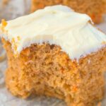 A slice of keto and low carb carrot cake with a cream cheese frosting