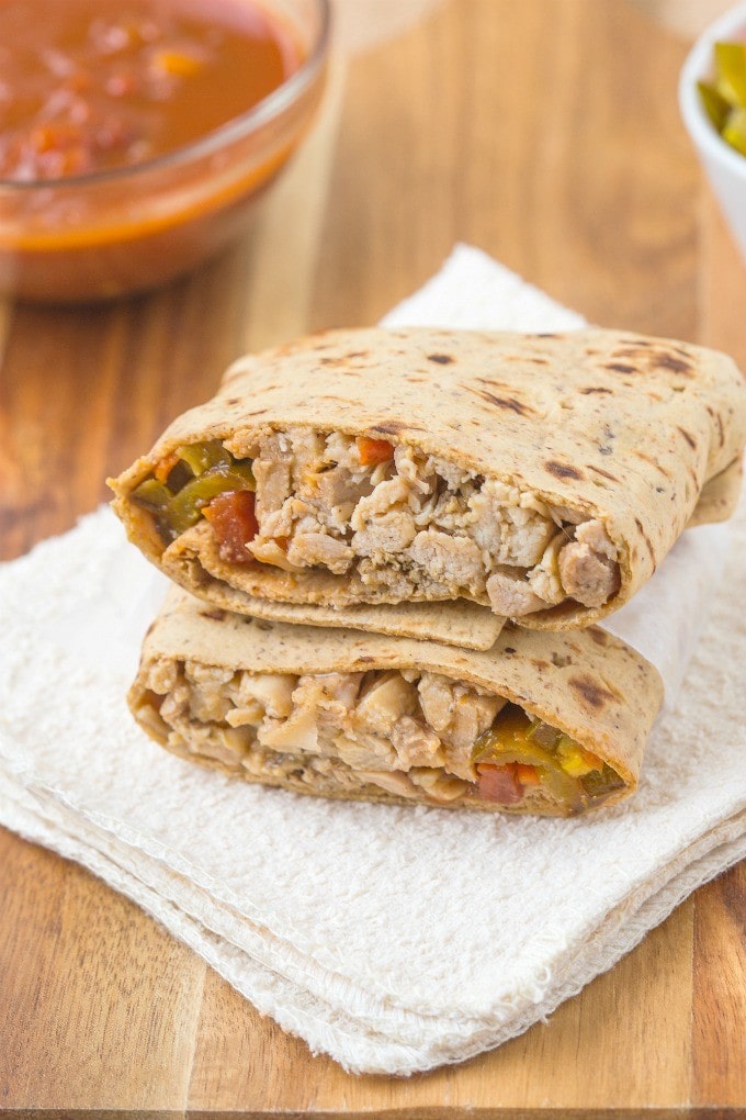 Healthy LOW CARB Mexican Chicken Wraps using a delicious flatbread which doesn't taste low carb at all- The filling is a flavor lover's dream- Sweet, spicy and filling! Freezer friendly too!