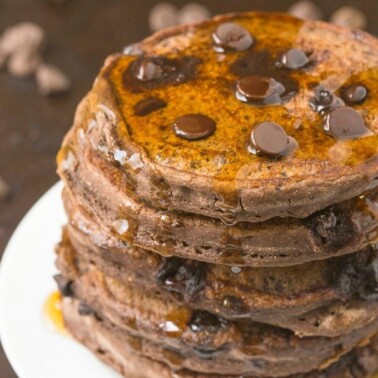 Healthy Thick and Fluffy Low Carb DOUBLE chocolate Pancakes which are SO easy, delicious and low in calories, but you wouldn't be able to tell- The BEST chocolate low carb pancakes out there! {vegan, gluten free, paleo recipe}- thebigmansworld.com