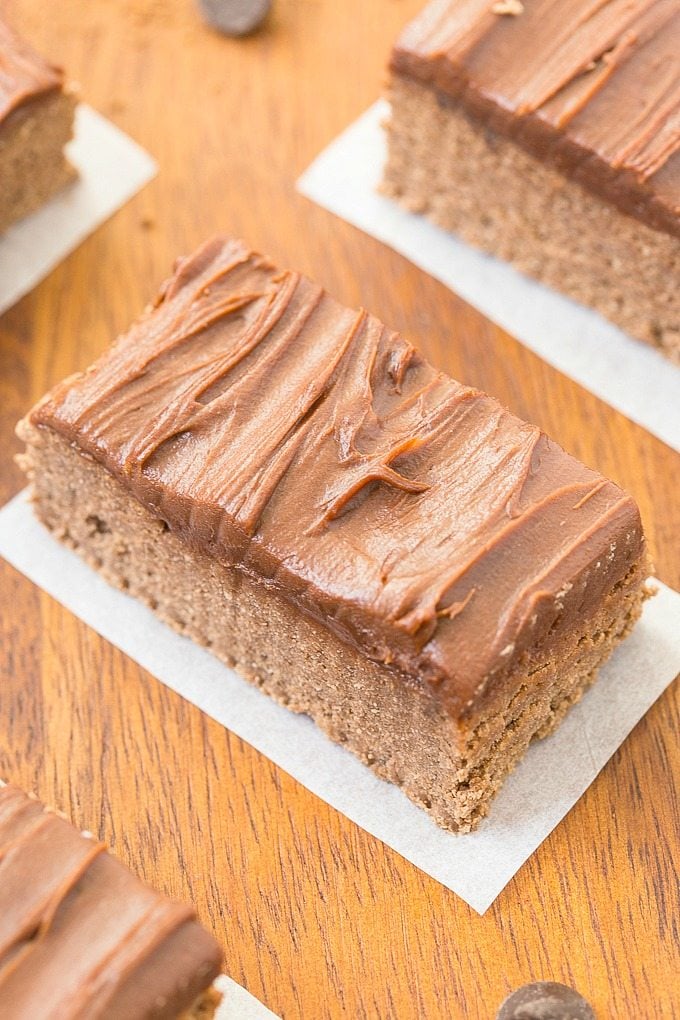 Healthy No Bake Chocolate Fudge Protein Bars- These taste like dessert but are SO easy and healthy- NO nasties and completely sugar AND grain free! {vegan, gluten free, paleo recipe}- thebigmansworld.com