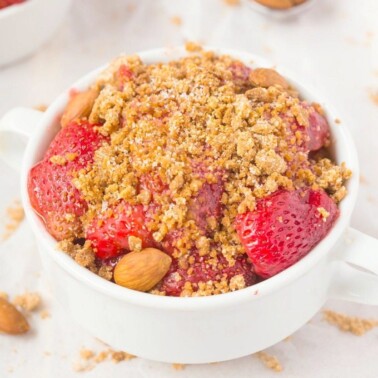 Healthy Fresh Strawberry Breakfast Crumble which can totally pass as dessert too- NO butter, oil, grains, white flour or sugar yet 100% delicious- SO EASY! {vegan, gluten free, paleo recipe}- thebigmansworld.com