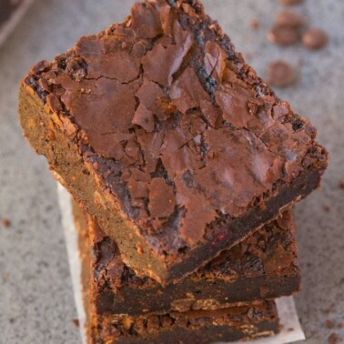 Healthier Flourless Chocolate Raspberry Brownies made with NO flour and NO butter and BETTER than boxed mixes- Fudgy, moist, gooey and with those gorgeous crinkled tops! {vegan, gluten free, paleo recipe}- thebigmansworld.com