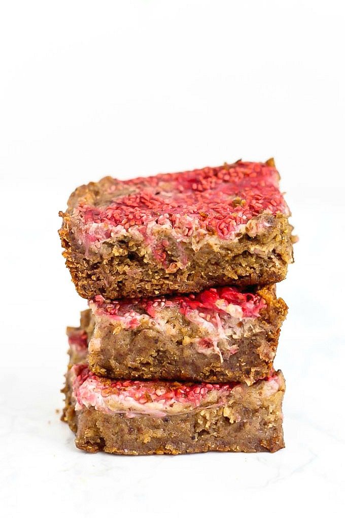 Healthy Almond Butter and Jelly BREAKFAST Bars- Fudgy and delicious baked bars made with NO butter, oil, grains or sugar, but you'd never tell! {vegan, gluten free, paleo recipe}- thebigmansworld.com