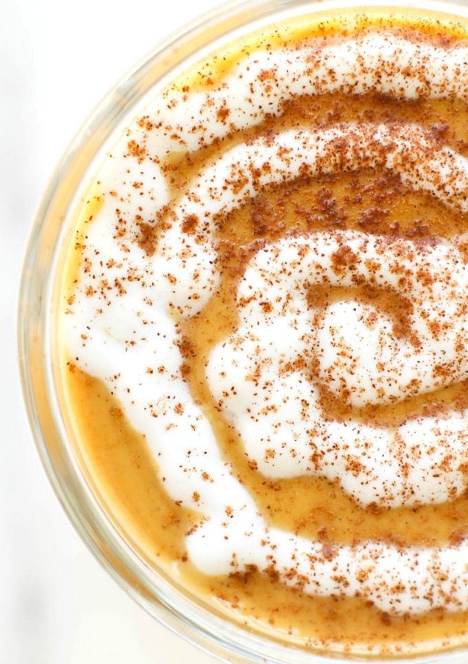 Healthy WARM Sticky Cinnamon Roll Smoothie- For Breakfast or a snack, this THICK and CREAMY recipe is PACKED with protein and tastes just like a cinnamon roll- Quick, easy and can be enjoyed hot or cold! {vegan, gluten free, sugar free, paleo recipe}- thebigmansworld.com