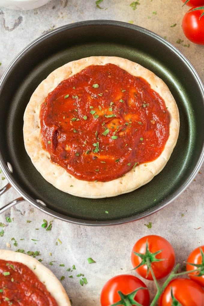 paleo pizza crust with tomato sauce.
