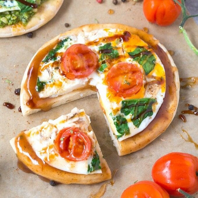 low carb pizza crusts topped with sauce and pesto