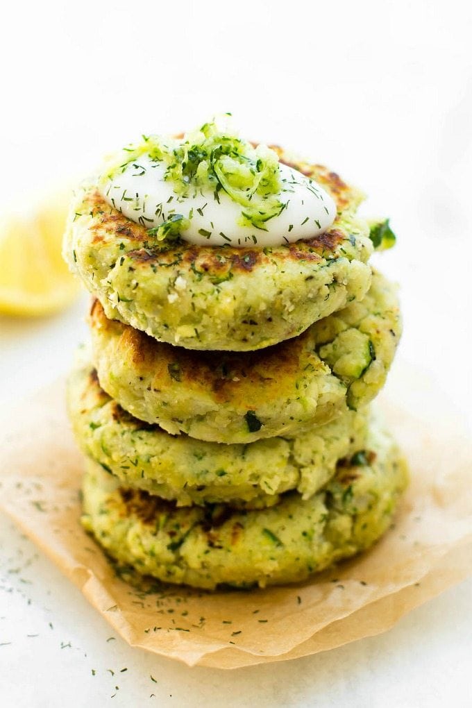 4 Ingredient Zucchini Cauliflower Fritters (V, GF, P, DF)- Crispy, easy and oil-free, these veggie packed cauliflower rice fritters need just four ingredients and 5 minutes to whip up! A kid-friendly meat-free/vegetarian meal! {vegan, gluten free, paleo recipe}- thebigmansworld.com