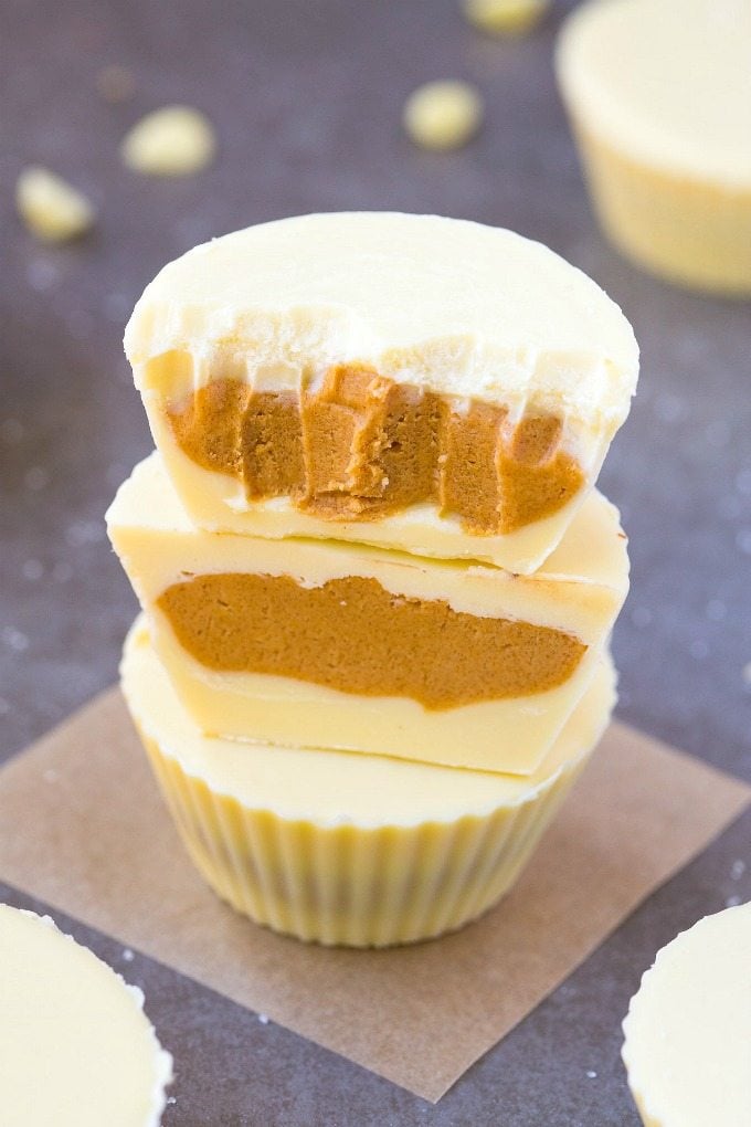 Keto Vegan White Chocolate Peanut Butter Cups- Reese's white chocolate peanut butter cups gets a keto, sugar-free and dairy-free makeover! A creamy, peanut butter filling covered in dairy-free, vegan and keto white chocolate! Nut-Free and Paleo option too! #ketogenic #ketodessert #vegandessert #vegancandy #peanutbutter #homemadecandy