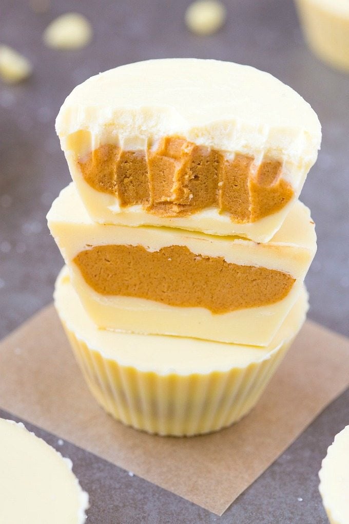 Keto Vegan White Chocolate Peanut Butter Cups- Reese's white chocolate peanut butter cups gets a keto, sugar-free and dairy-free makeover! A creamy, peanut butter filling covered in dairy-free, vegan and keto white chocolate! Nut-Free and Paleo option too! #ketogenic #ketodessert #vegandessert #vegancandy #peanutbutter #homemadecandy