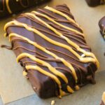 Low Carb No Bake Chocolate Peanut Butter Bars (Keto, Vegan, Sugar Free, Gluten Free)- Easy and healthy bars which taste just like a Reese's Peanut Butter Cup but made completely sugar-free! The perfect snack or dessert. #keto #ketodessert #peanutbutter #healthy #nobake | Recipe on thebigmansworld.com
