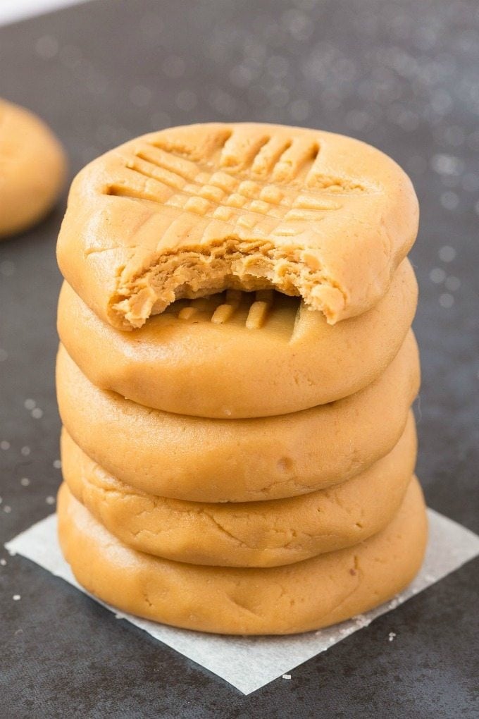 3-Ingredient No Bake Peanut Butter Cookies (Keto, Paleo, Vegan, Sugar Free)- Make these easy no bake cookies in under 5 minutes, to satisfy your sweet tooth the healthy way! Low carb, thick, fudgy and loaded with peanut butter! #lowcarbrecipe #nobakecookies #ketodessert #lowcarb #sugarfree | Recipe on thebigmansworld.com