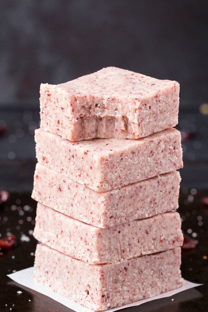 4-Ingredient No Bake Coconut Cranberry Crack Bars (Paleo, Vegan, Keto, Sugar Free, Gluten Free)- Easy, healthy and seriously addictive coconut cranberry bars using just 4 ingredients and needing 5 minutes! A satisfying snack, dessert or holiday gift. #keto #ketodessert #coconut #cranberry #nobake | Recipe on thebigmansworld.com