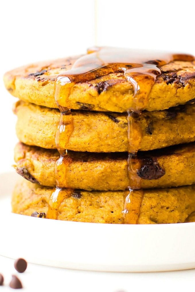 Fluffy Low Carb Keto Chocolate Chip Pancakes (Paleo, Vegan, Sugar Free, Gluten Free)- A quick and easy recipe for Thick, fluffy flourless pancakes with chocolate chips- Easy everyday ingredients, freezer-friendly and a healthy ketogenic breakfast option! #ketopancakes #lowcarbpancakes #veganpancakes #paleopancakes | Recipe on thebigmansworld.com