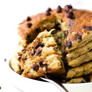 Fluffy Low Carb Keto Pancakes with zucchini (Paleo, Vegan, Gluten Free, Sugar Free)- An easy recipe for thick fluffy flourless keto zucchini bread pancakes made with almond flour and coconut flour- A delicious sugar free breakfast or brunch! #pancakes #lowcarbrecipes #lowcarbpancakes #ketobreakfast #veganpancakes | recipe on thebigmansworld.com