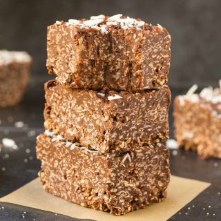 Homemade No Bake Keto Chocolate Coconut Crunch Bars (Paleo, Vegan, Sugar Free, Low Carb)- An easy recipe for copycat crunch bars loaded with coconut and chocolate-a ketogenic and sugar free makeover! The ultimate keto-friendly dessert and snack recipe ready in 5 minutes! #ketogenicdessert #ketodessert #lowcarb #sugarfree #paleo | Recipe on thebigmansworld.com