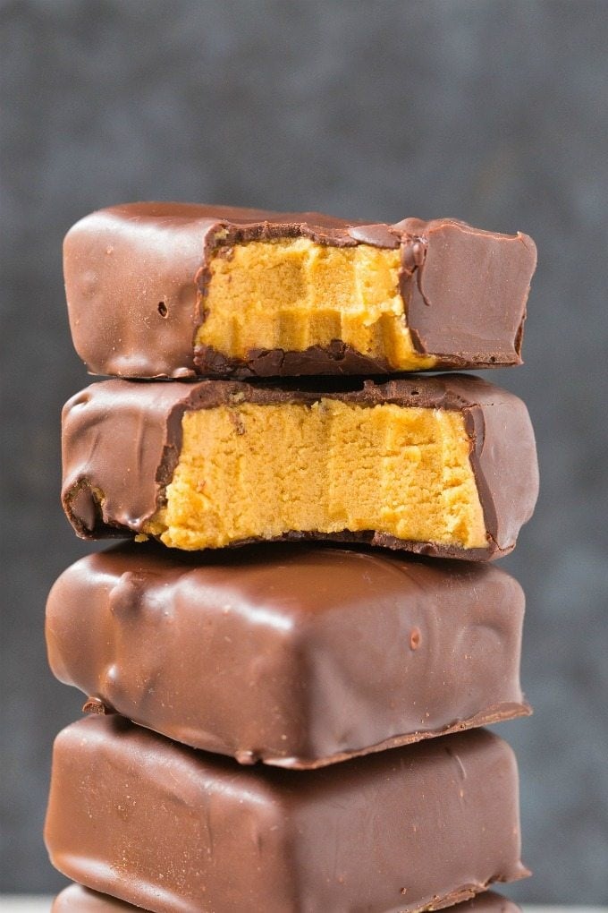 Healthy No Bake Peanut Butter Chocolate Bars in a stack of top of one another