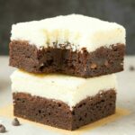 Healthy Vegan Coconut Brownies (Keto, Low Carb, Paleo, Gluten Free)- A thick, fudgy flourless brownie base topped with an addictive layer of thick coconut crack! Made with no eggs and no sugar, they are the best healthy dessert! #ketodessert #ketorecipe #healthybrownies #chocolate #coconut #veganrecipe | thebigmansworld.com