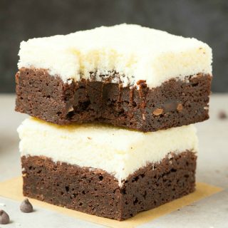 Healthy Vegan Coconut Brownies (Keto, Low Carb, Paleo, Gluten Free)- A thick, fudgy flourless brownie base topped with an addictive layer of thick coconut crack! Made with no eggs and no sugar, they are the best healthy dessert! #ketodessert #ketorecipe #healthybrownies #chocolate #coconut #veganrecipe | thebigmansworld.com