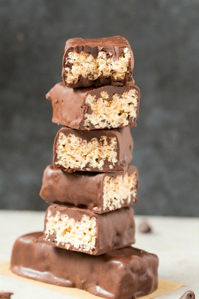 Homemade Low Carb CRUNCH Protein Bars stacked on top of one another.