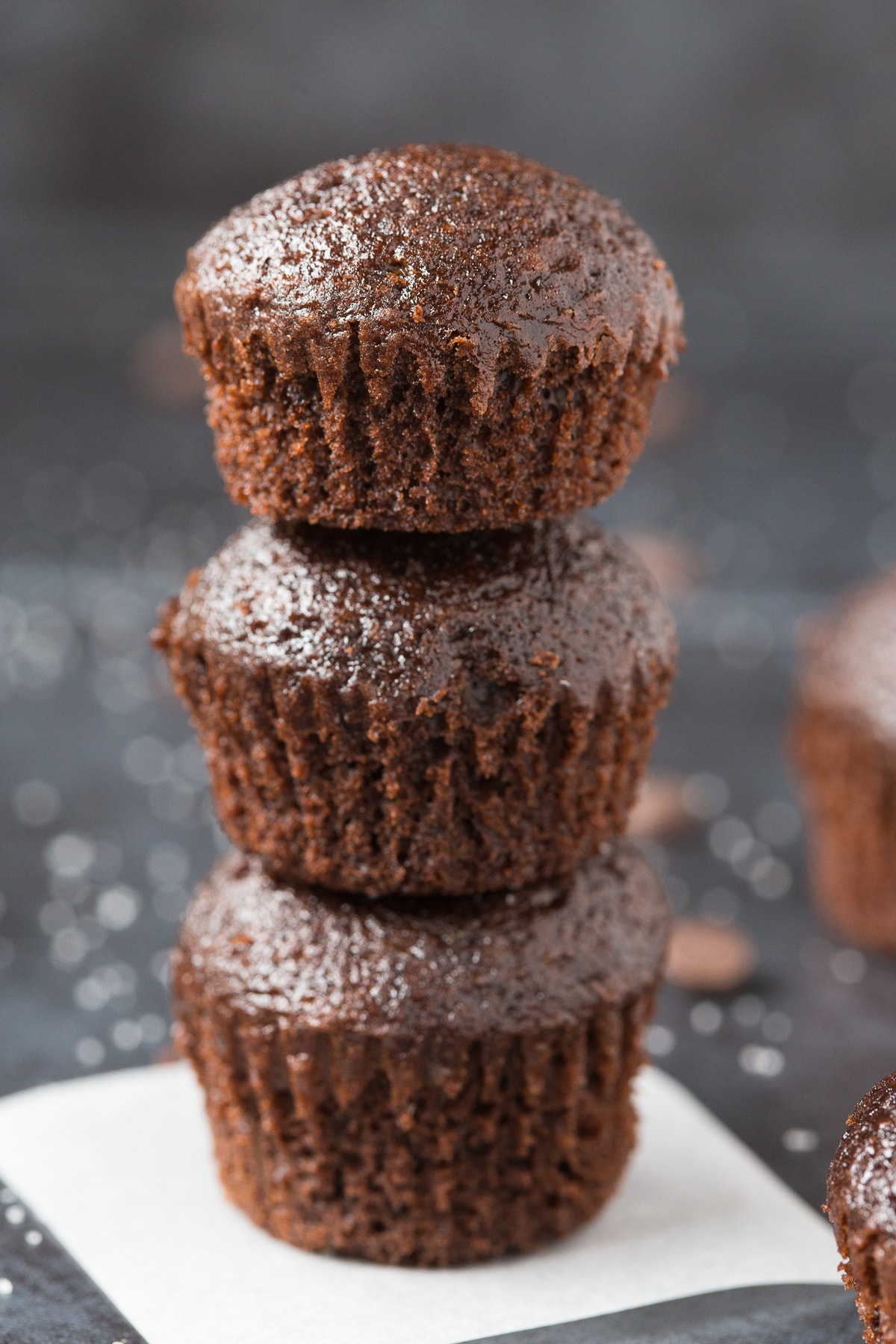 Healthy Flourless Paleo Vegan Brownie Bites stacked on top of one another