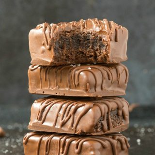 Flourless 4-Ingredient Keto Protein Brownies (Paleo, Vegan, Low Carb)- Easy and healthy fudgy gooey protein brownies made with NO sugar and NO eggs- A healthy ketogenic dessert or post workout snack! #proteinbrownies #proteinpowder #ketodessert #lowcarb #veganbaking | Recipe on thebigmansworld.com
