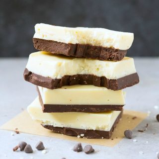 2-Ingredient Low Carb Keto Chocolate Coconut Fat Bombs (Paleo, Vegan, Sugar Free)- A fool proof recipe for keto chocolate and coconut butter to make these easy coconut fat bombs- NO sugar, NO dairy and ready in 5 minutes! #fatbombs #ketosnack #ketodessert #lowcarbdessert | Recipe on thebigmansworld.com