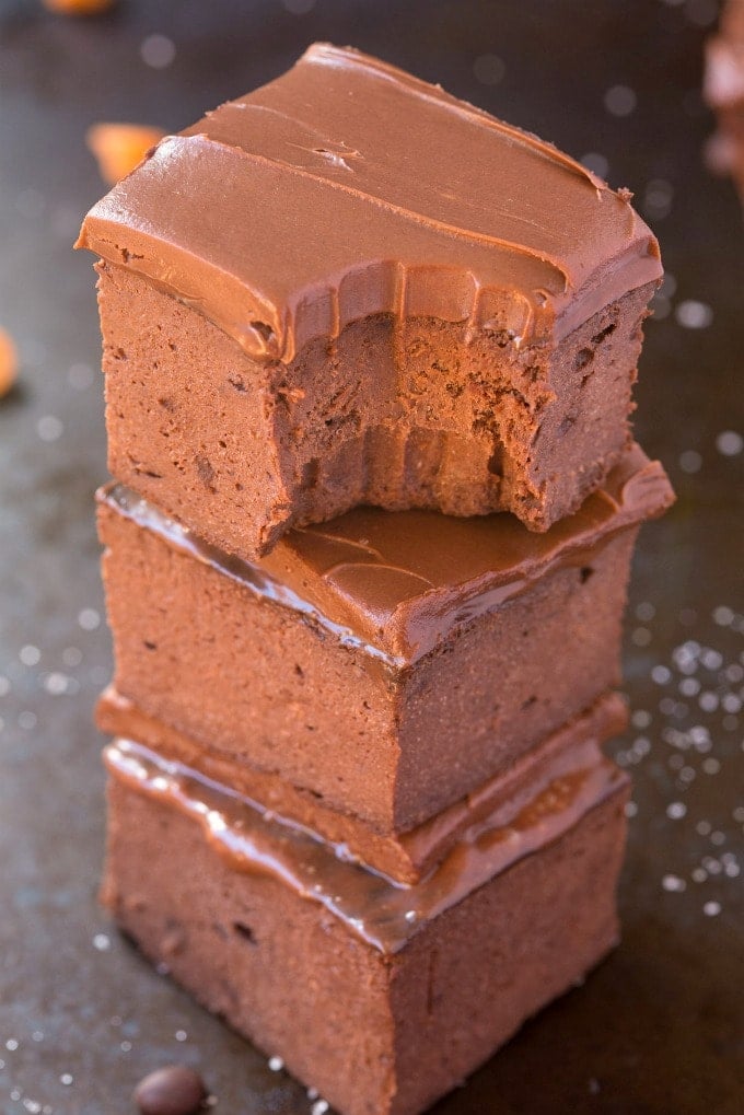 3-Ingredient Flourless Pumpkin Brownies stacked on top of one another.