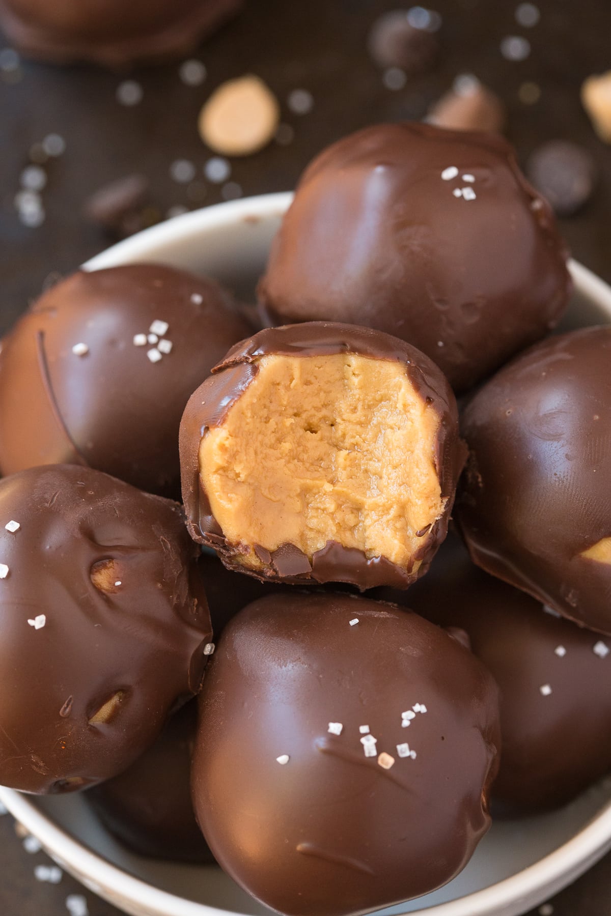 4-Ingredient No Bake Keto Chocolate Peanut Butter Balls (Paleo, Vegan, Low Carb)- An easy healthy no bake chocolate peanut butter protein balls recipe ready in 5 minutes and needing 4 ingredients! A quick and easy snack! #peanutbutter #chocolatepeanutbutter #proteinballs #ketorecipe | Recipe on thebigmansworld.com