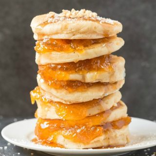 Healthy Flourless Pumpkin Spice Pancakes (Paleo, Vegan, Keto, Low Carb)- Thick, fluffy pancakes made with almond flour and coconut flour- Tested with an eggless and flourless option too- The perfect protein-packed, filling and healthy breakfast! #pumpkinpancakes #ketopancakes #paleopancakes #veganpancakes #keto | Recipe on thebigmansworld.com