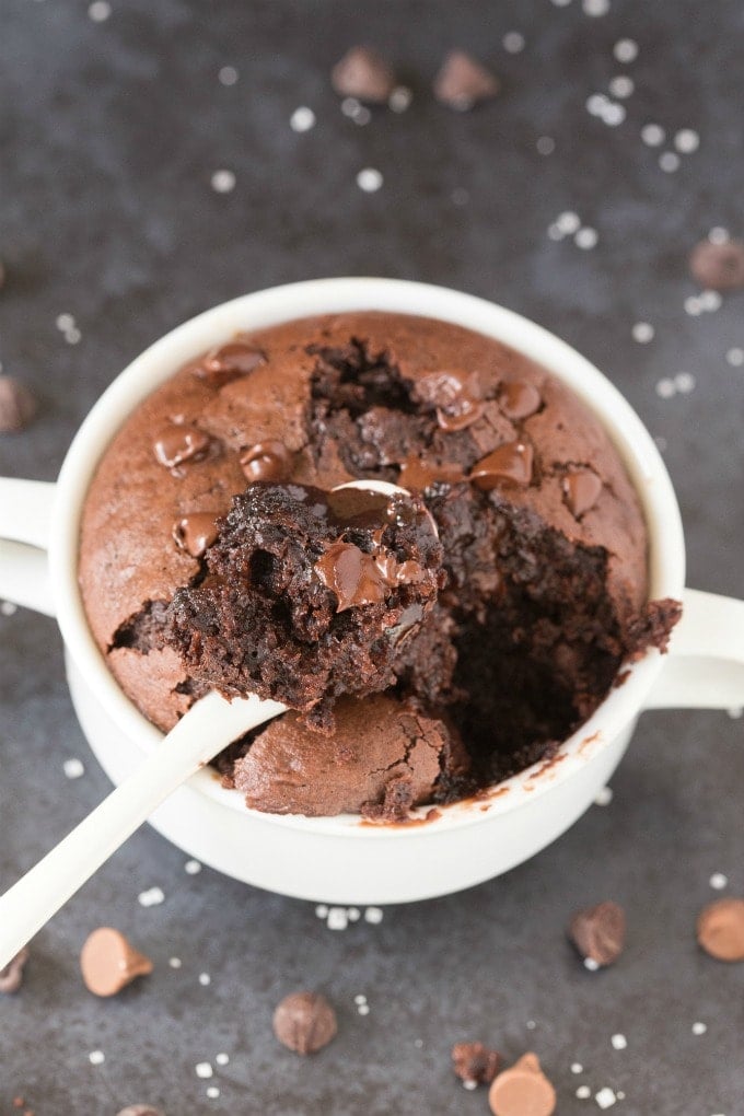 Healthy 1-Minute Flourless Mug Brownie with a white spoon in it