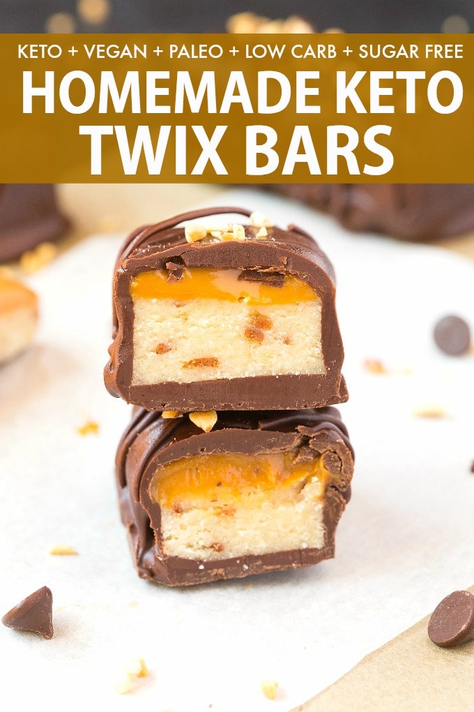 A healthy homemade keto twix bar cut in half showing the gooey caramel center.