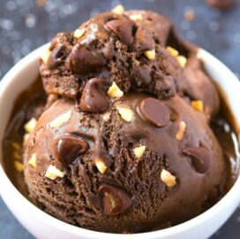 A scoop of keto chocolate ice cream in a white bowl