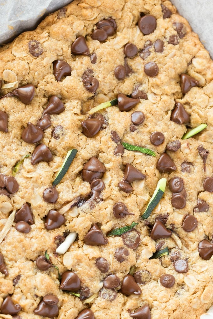 Zucchini Oatmeal Breakfast Bars with chocolate chips are a vegan and gluten free dessert healthy enough to eat for breakfast!