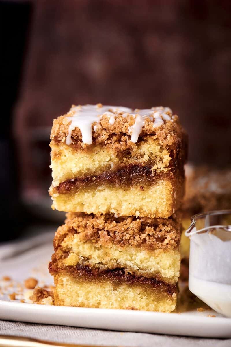 vegan coffee cake squares stacked on one another. 