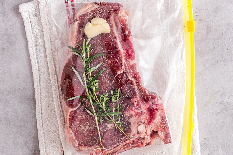 steak in ziplock bag.