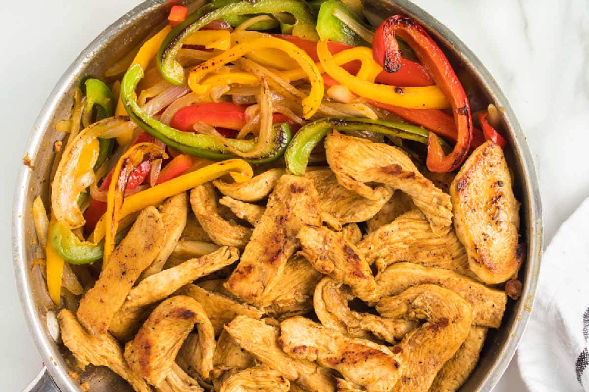 chicken with vegetables mixed together.