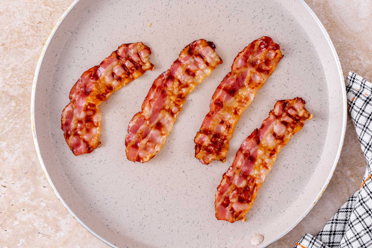 crispy bacon in pan.