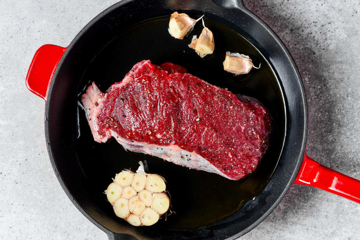 steak in skillet.