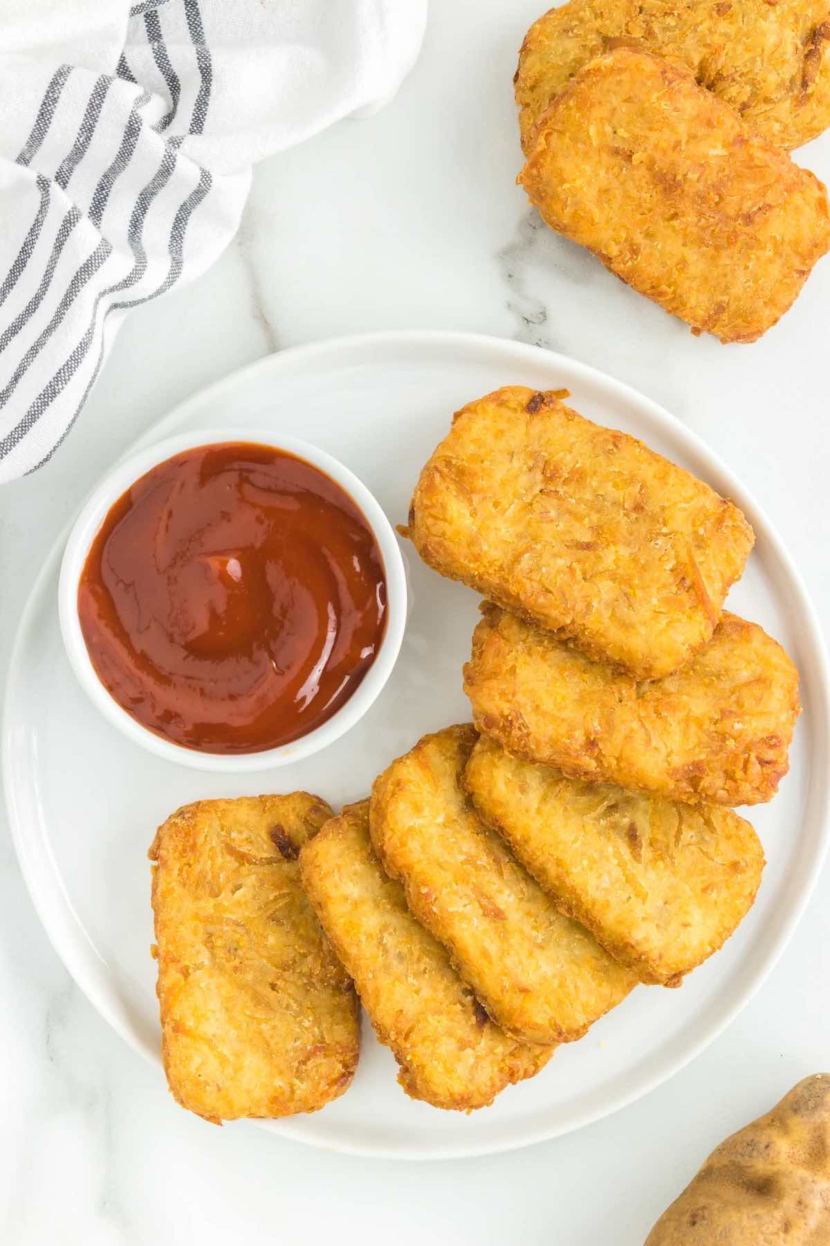 https://thebigmansworld.com/wp-content/uploads/2023/02/homemade-hash-browns.jpg